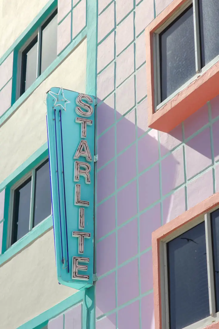 Starlite exterior in 80s pastels with neon sign