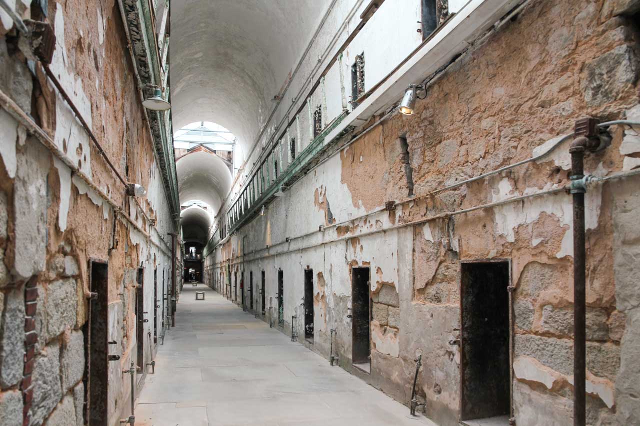 Corridor with vaulted ceiling and cell doors