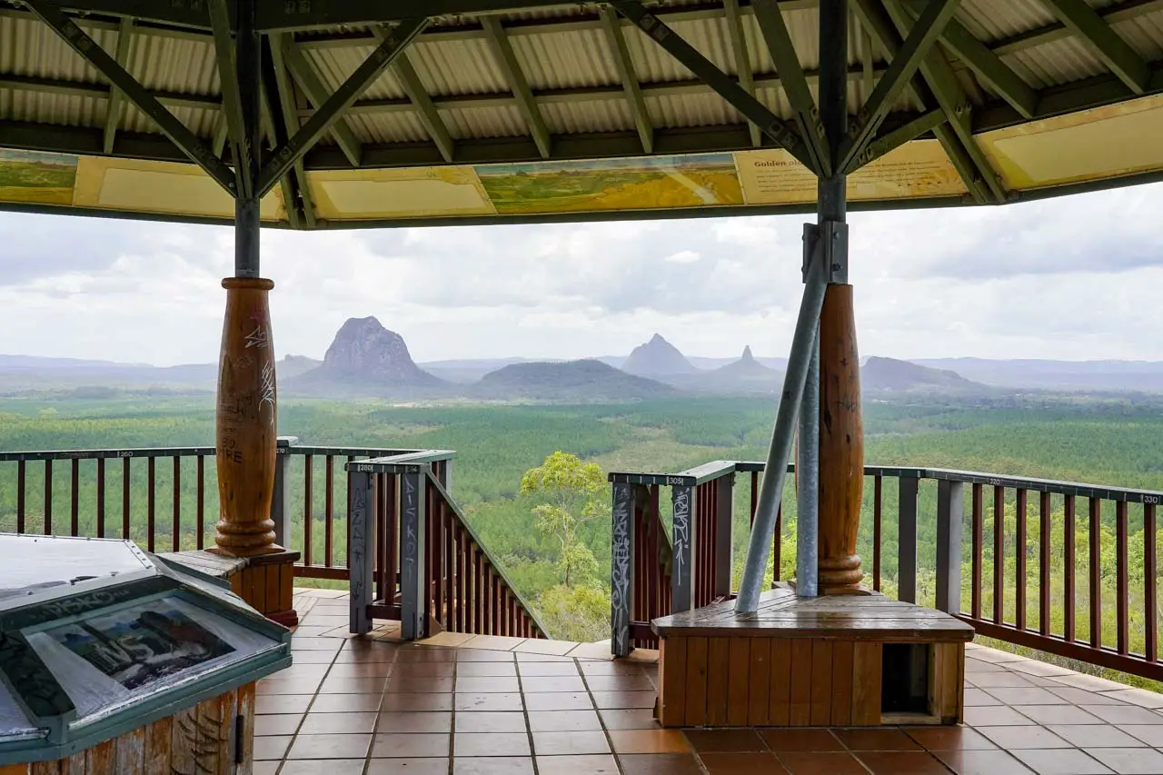 View of Glass House Mountains with interior of lookout in foreground