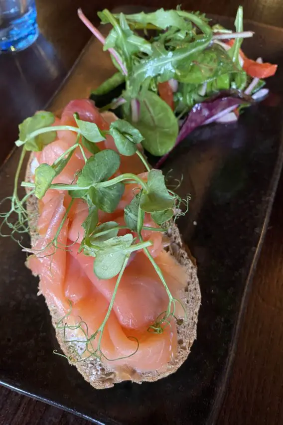 Scottish smoked salmon on bread with salad