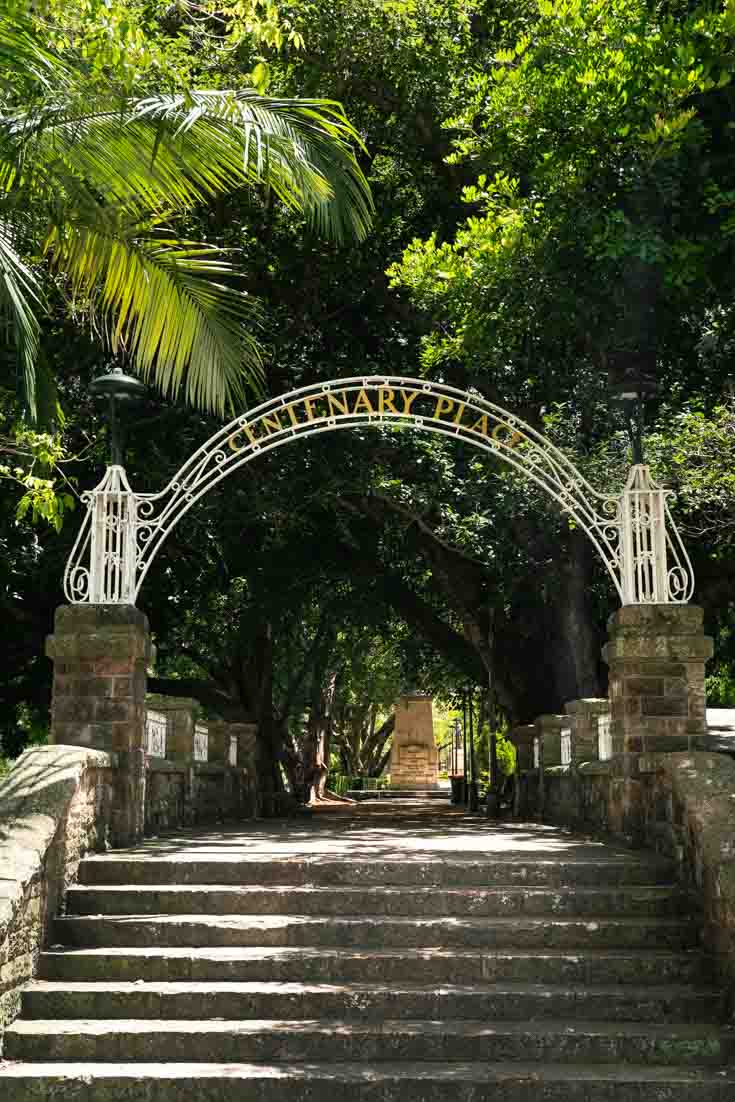 Image of arched entrance to park with name "Centenary Place"
