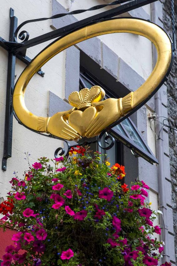 Gold sign on exterior of Claddagh Jewellers, Galway