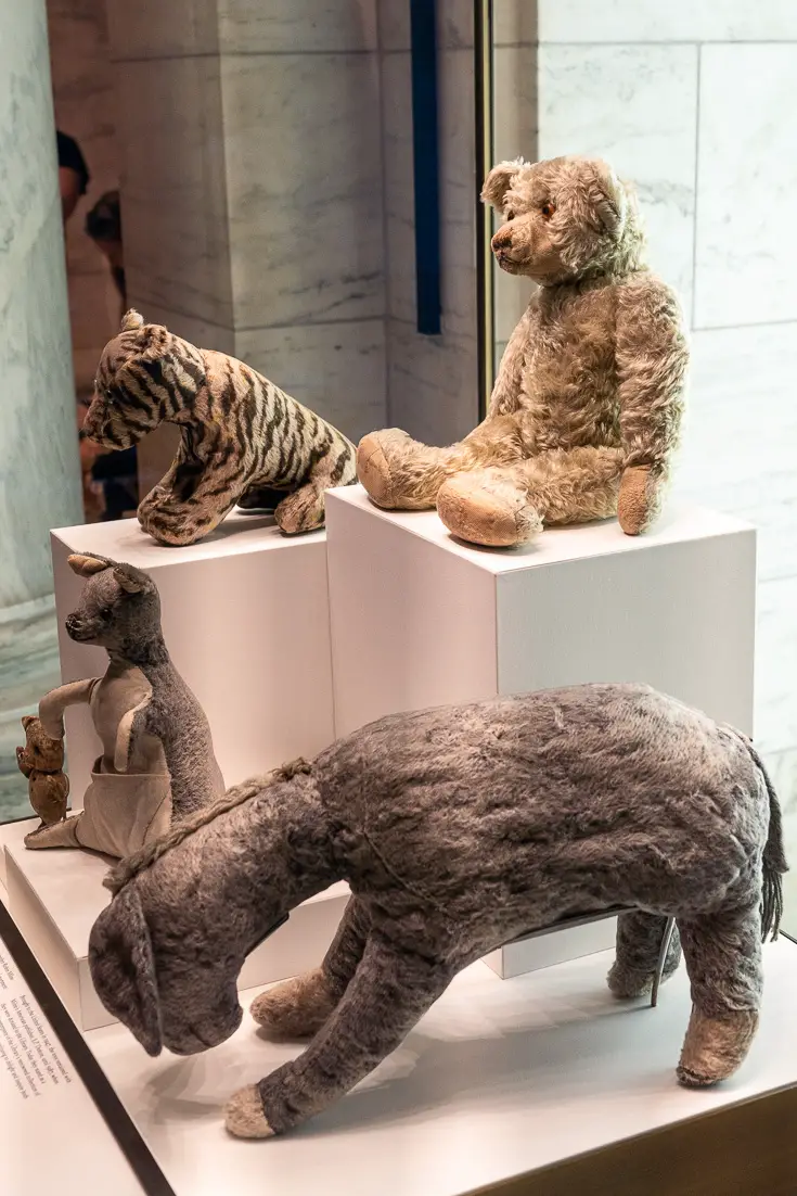 Four stuffed toys: a bear, donkey, tiger and kangaroo