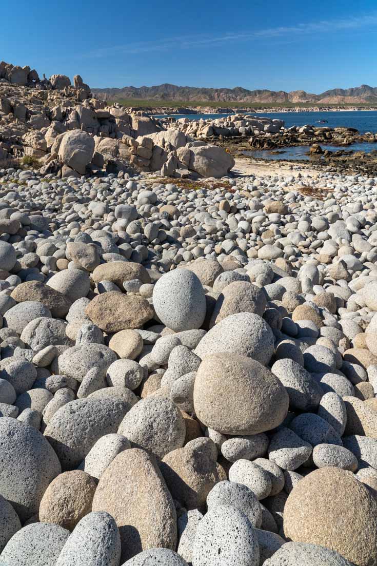 Beach covered in large stones Beach covered in large rounded stones