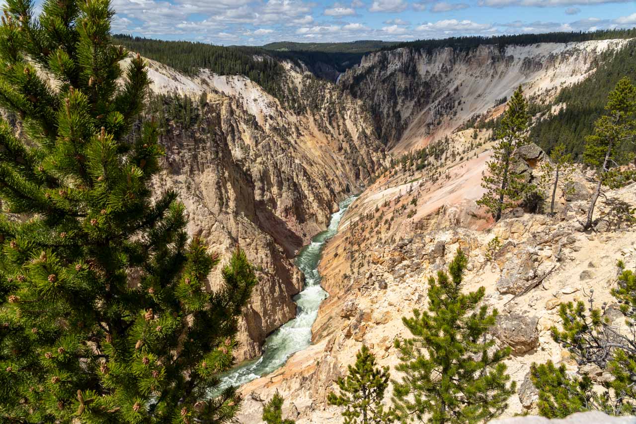 Yellowstone River flowing through the colourful geology of a deep canyon