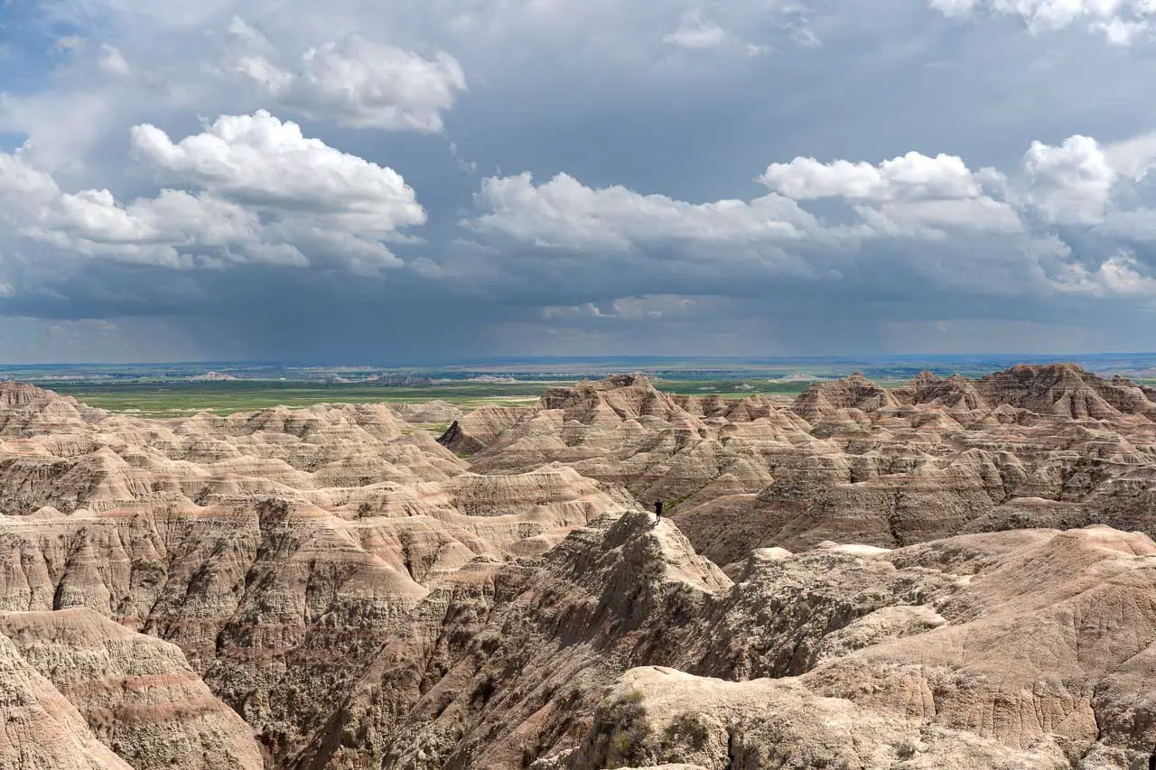 Badlands with storm on the horizon