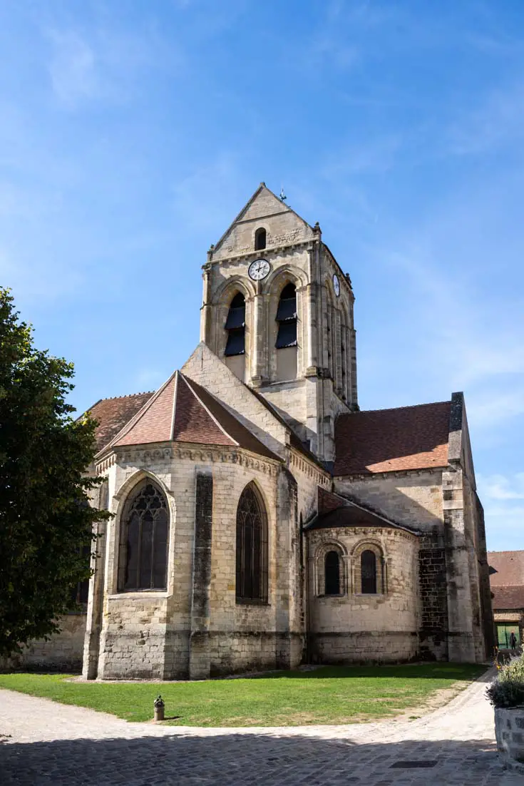 Late-Romanesque style church with blue sky
