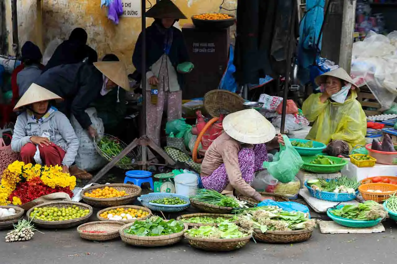 Women selling fresh vegetable at Hoi An Central Market