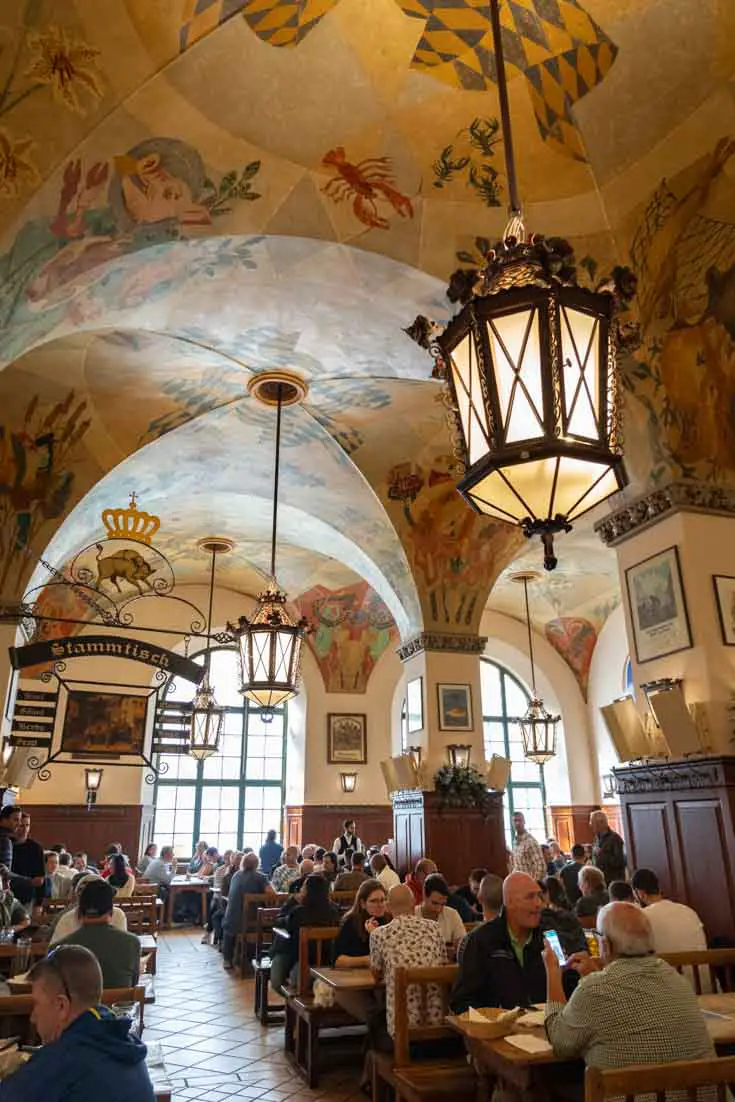Interior of Hofbräuhaus with muralled ceilings