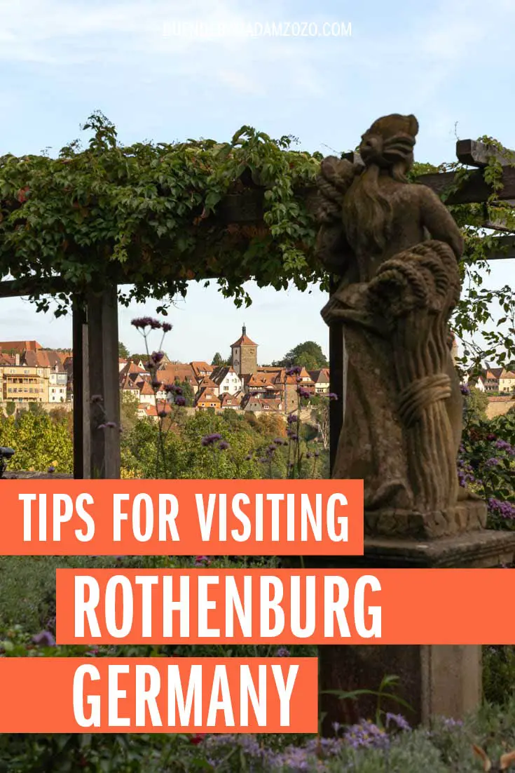 Town skyline framed by statue and garden trellis with text "Tips for Visiting Rothenburg Germany"