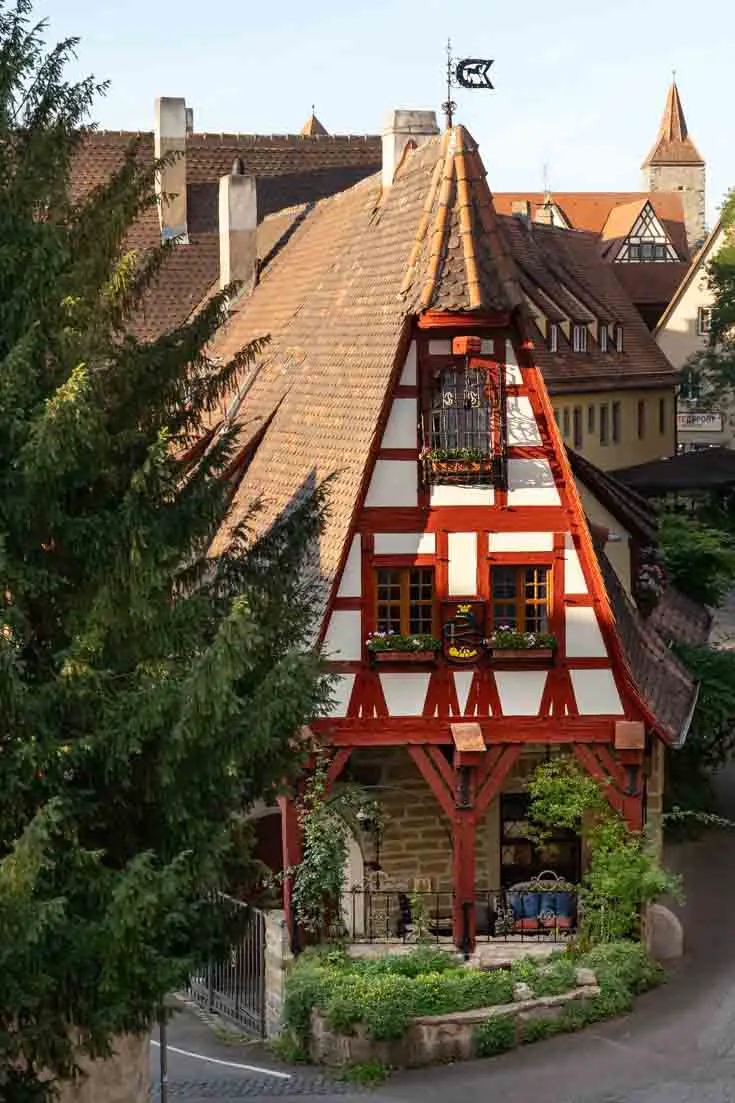Red and white-painted, half-timbered house
