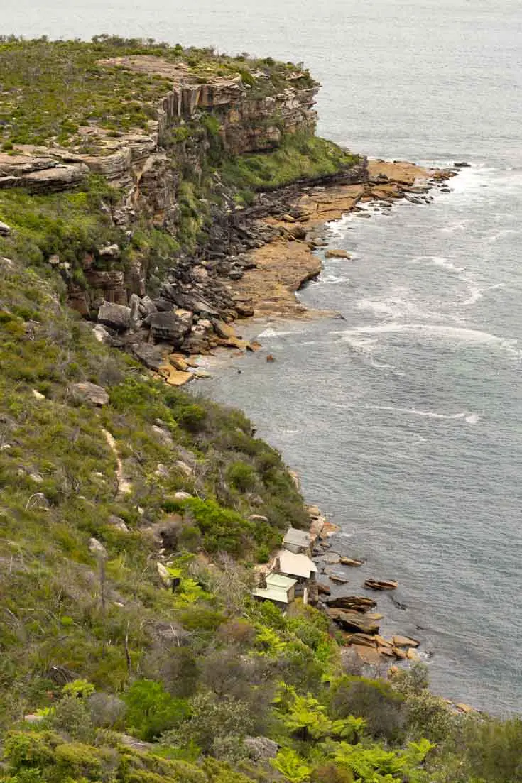 Fishing huts on edge of cliffs along Sydney Harbour