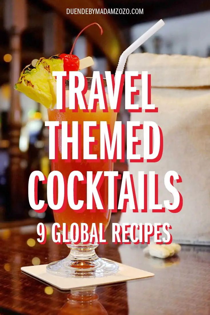 Image of cocktail on a bar with title "Travel Themed Cocktails - 9  Global Recipes"