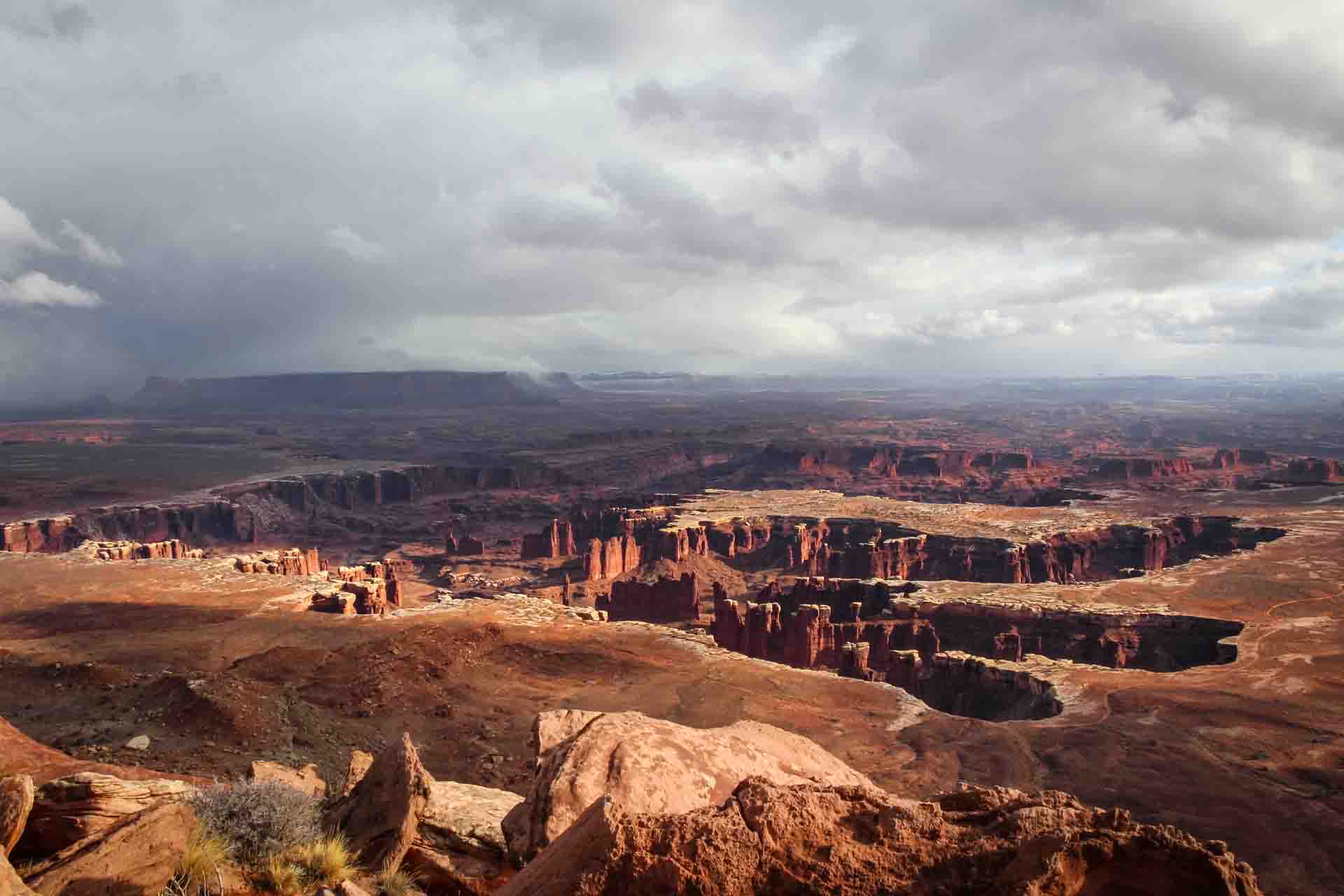 View over Canyonlands National Park from Island in the Sky on a stormy day