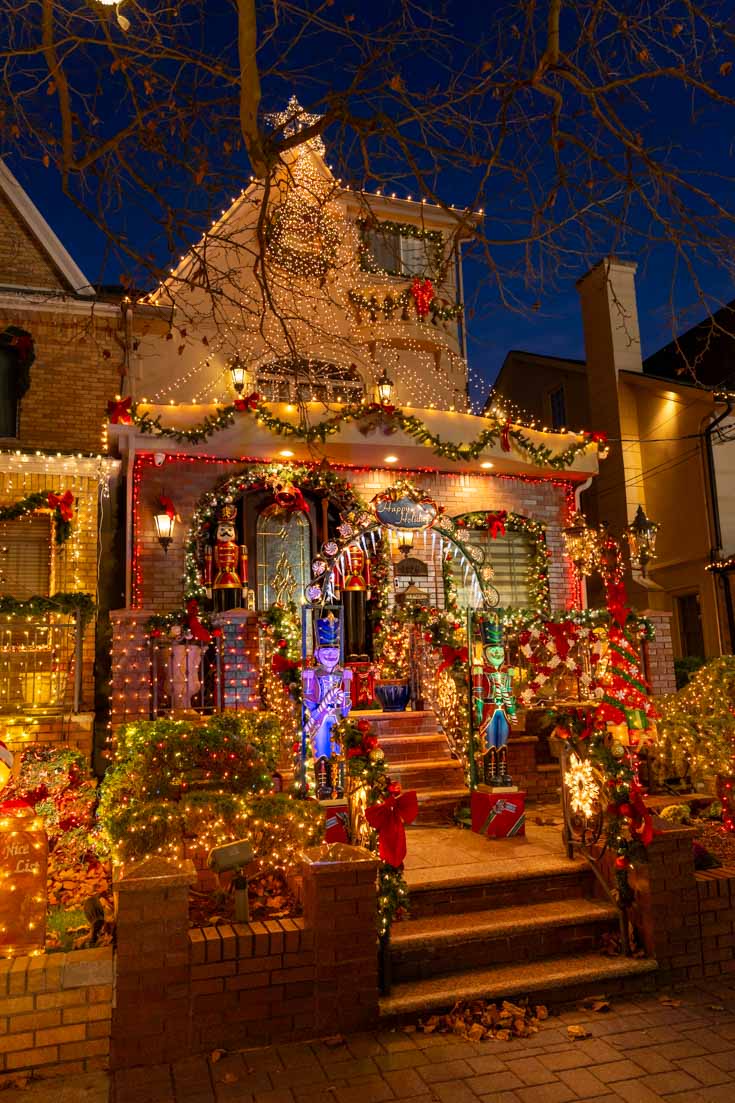 Suburban home decorated with colourful Christmas lights