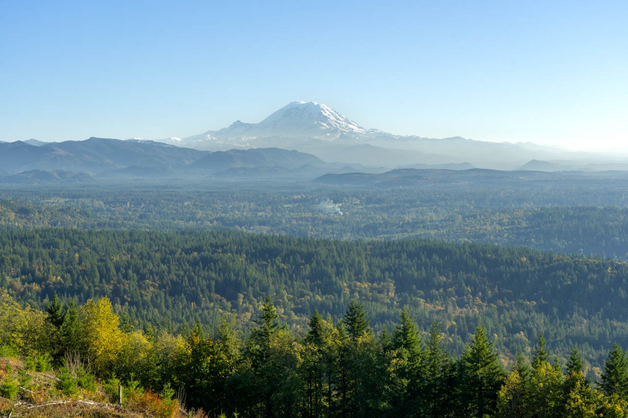 View to Mt Rainier from Poo Poo Point on a hazy, autumn afternoon with clear blue sky