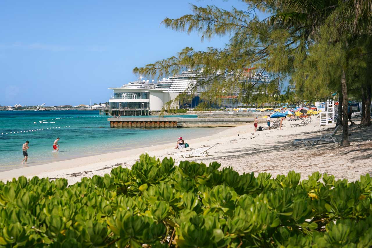 Quiet end of Junkanoo Beach, Nassau with cruise terminal in background
