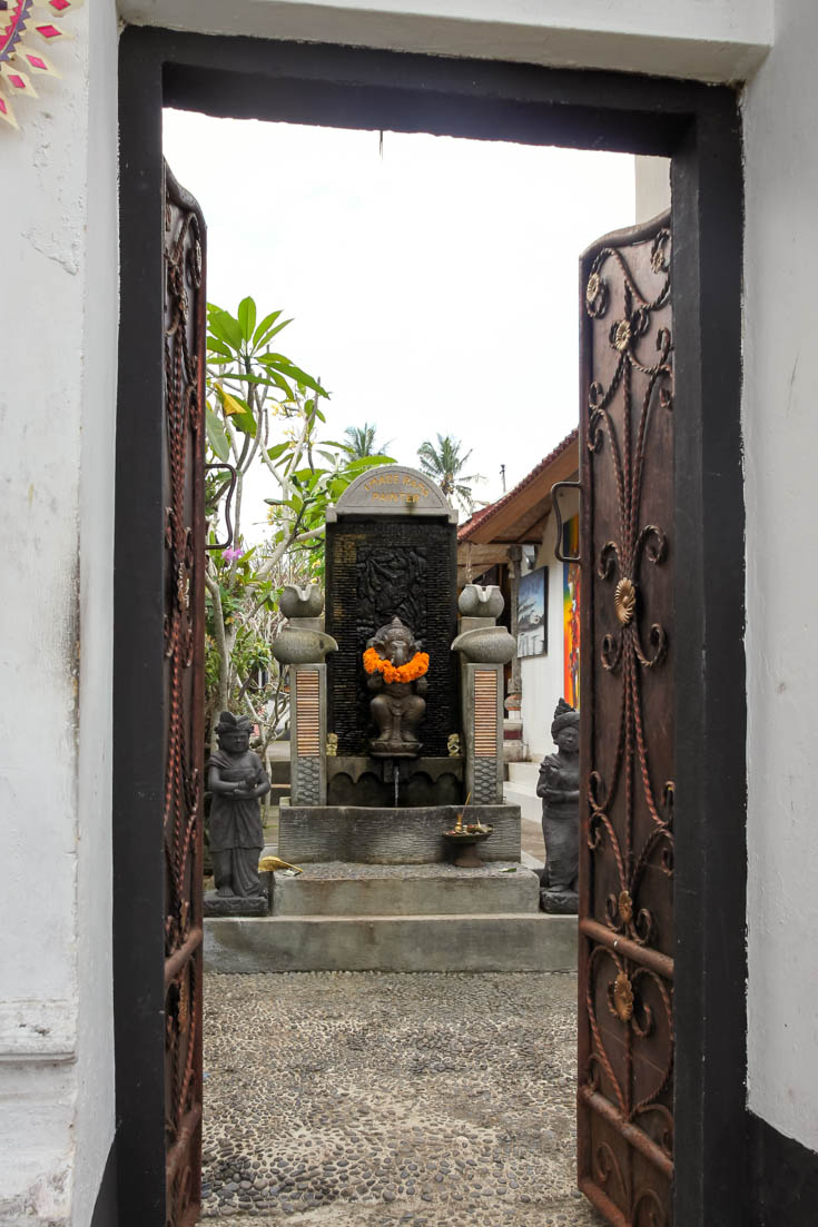 Doorway into a courtyard with a Hindu shrine