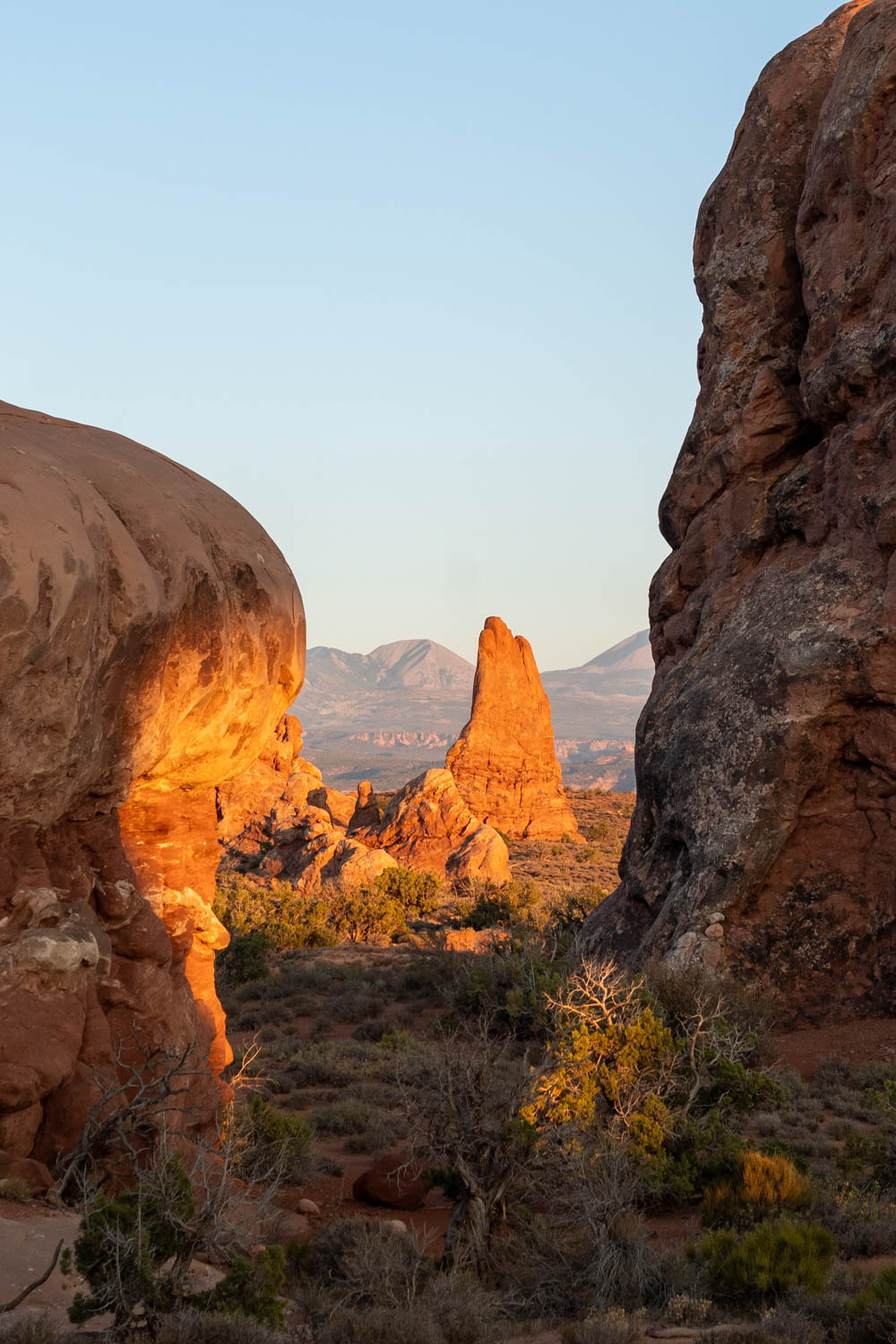 Glowing red rock spire at sunset