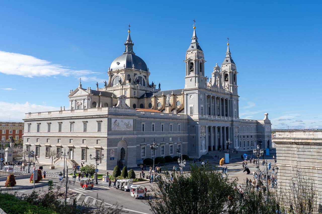 The Neoclassic, Neo-Gothic, Baroque Almudena Cathedral of Madrid on a blue-sky day
