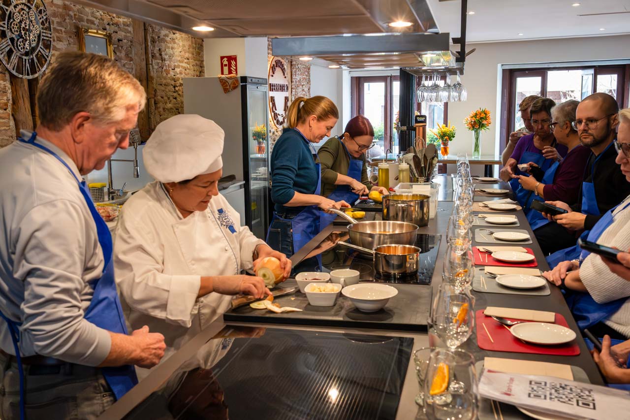 Group cooking class in open kitchen