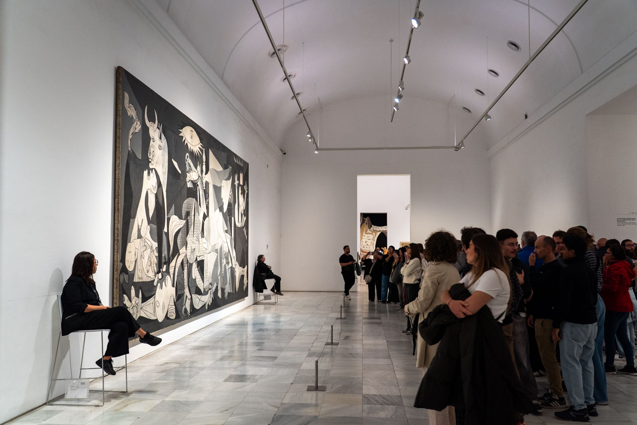 Crowd viewing Picasso painting, Guernica, at Museo Reina Sophia