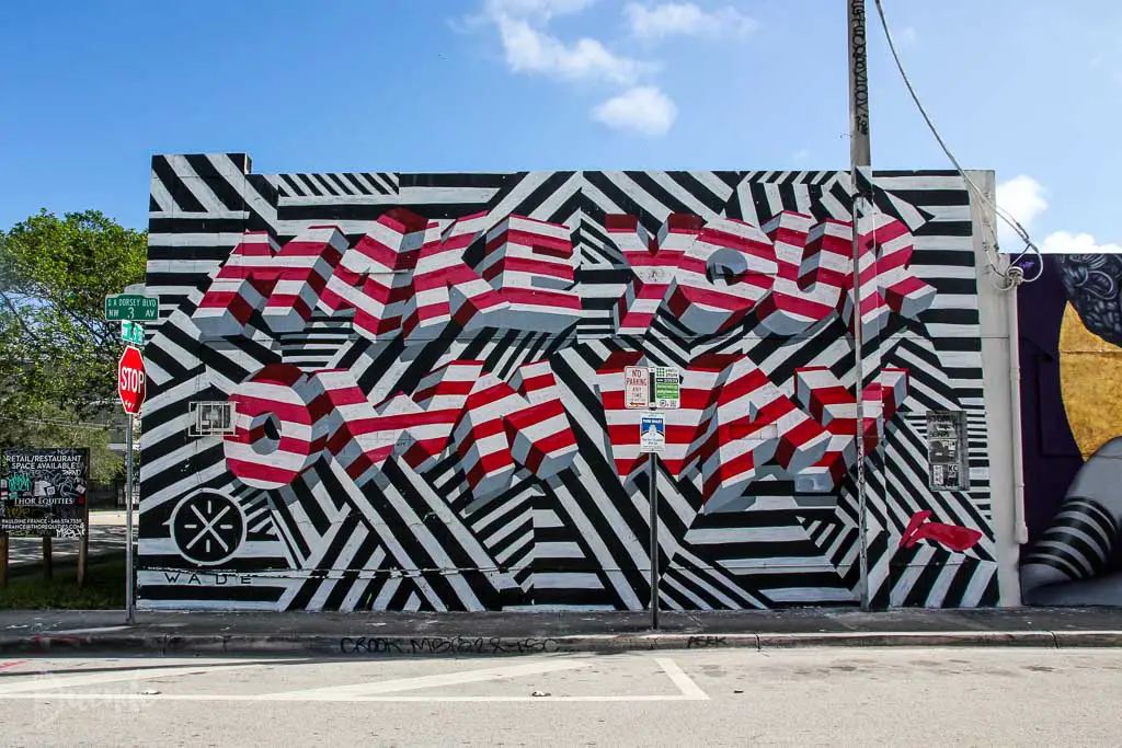 Striped black, white and red mural by Dwayne Wade