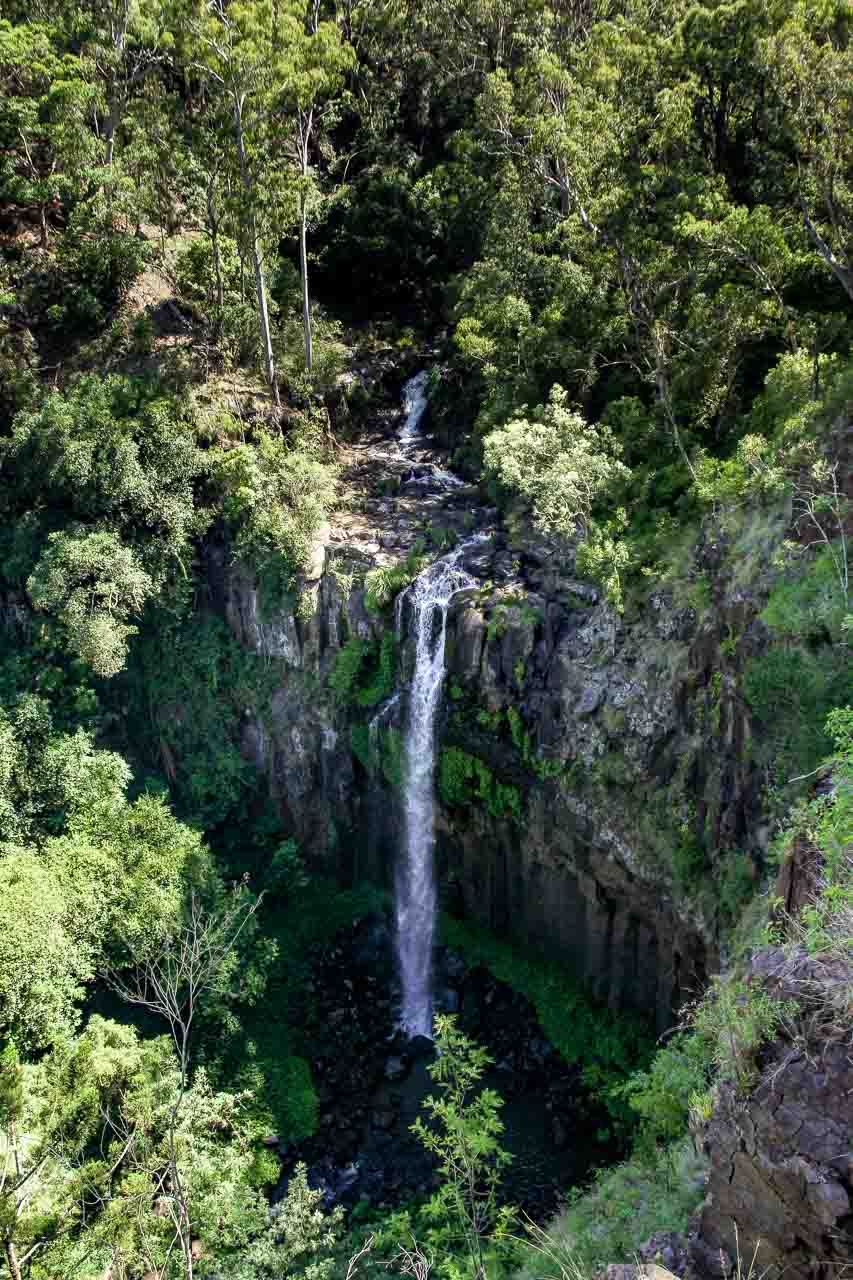 Large drop waterfall over side of cliff, viewed from above