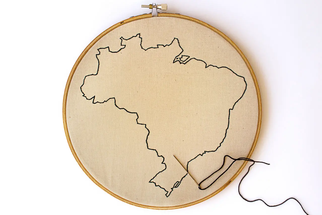 Embroidered outline of a map of Brasil in embroidery hoop