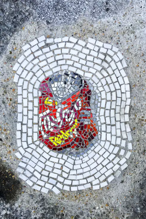 Mosaic street art in concrete