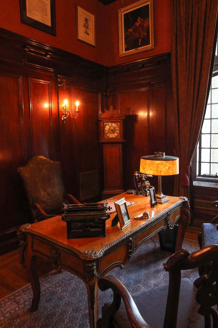 Wood panelled study with desk