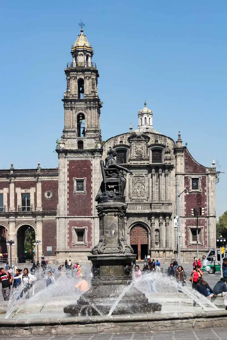 Exterior of Church of Santo Domingo and its Plaza with fountain in foreground
