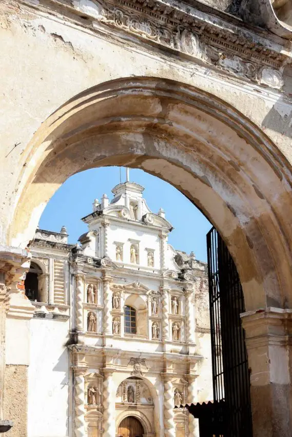 Santo Domingo Church front, viewed through archway
