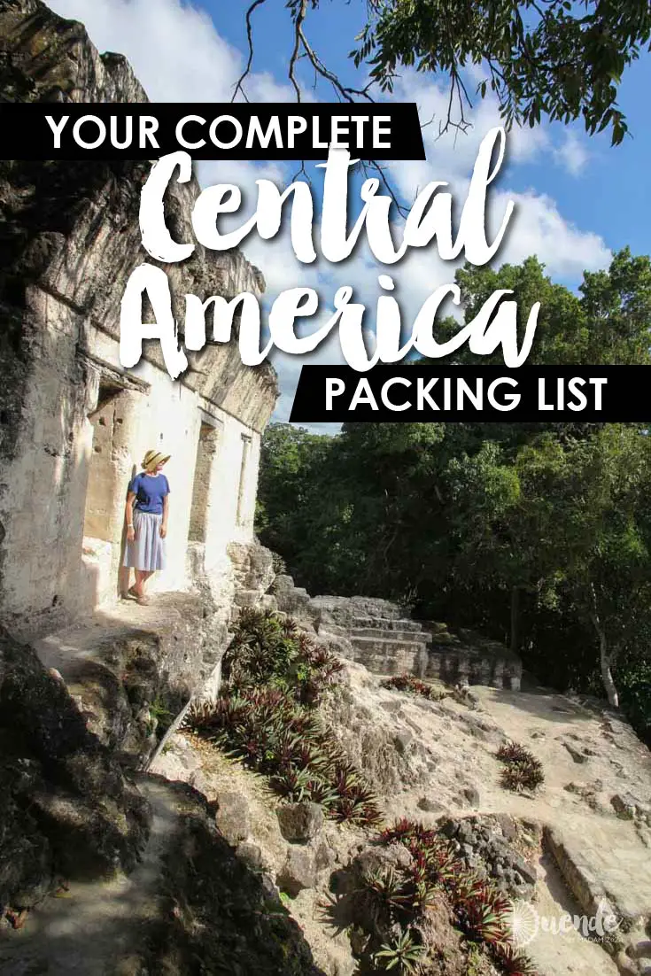 Image of women in blue shirt looking out over archaeological site with text overlay "Your Complete Central America Packing List"
