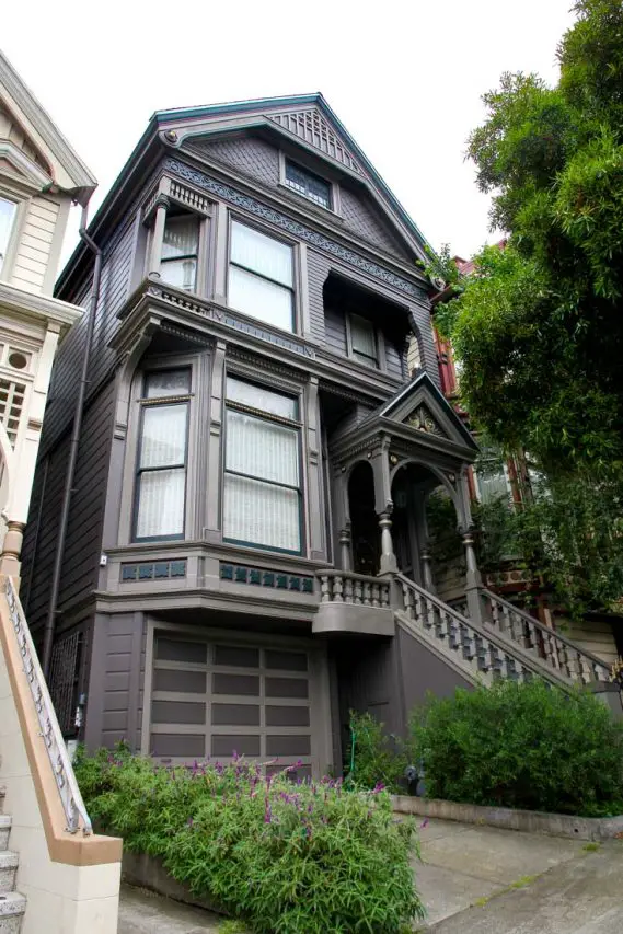 Grey and green Victorian that was once home to the Grateful Dead