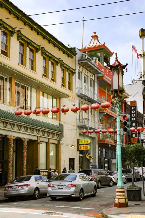 Chinatown street with red lanterns and pagoda inspired architecture