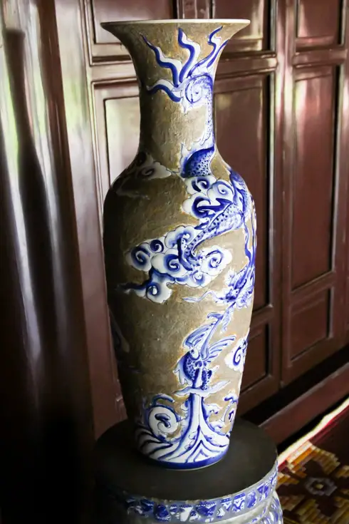 A dragon amongst lucky clouds on a porcelain vase in Hue, Vietnam