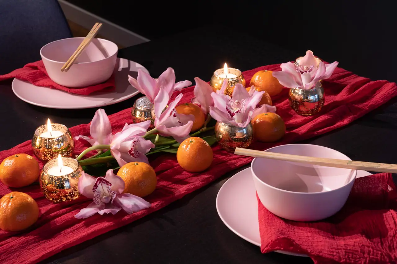 Chinese New Year dinner party table setting in spring hues