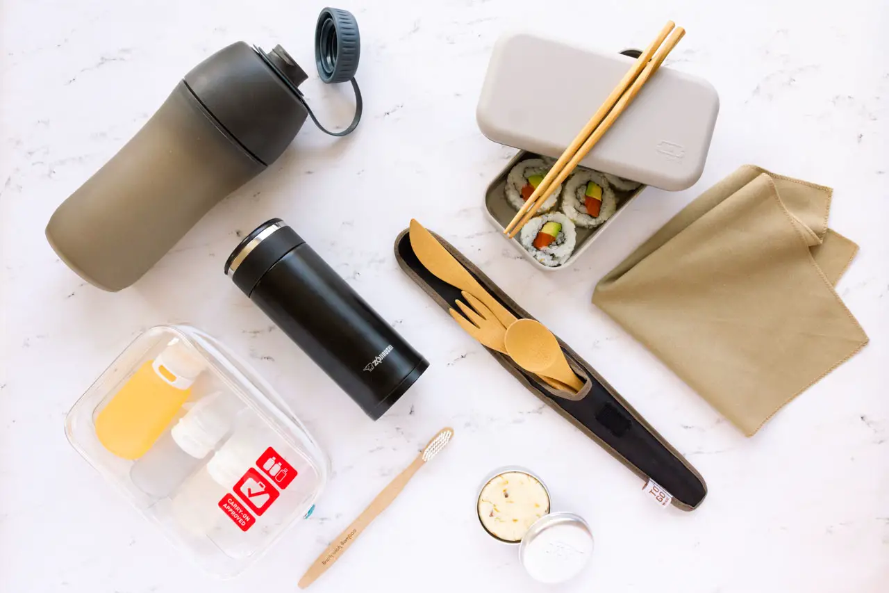 Flatlay of essential, sustainable travel products