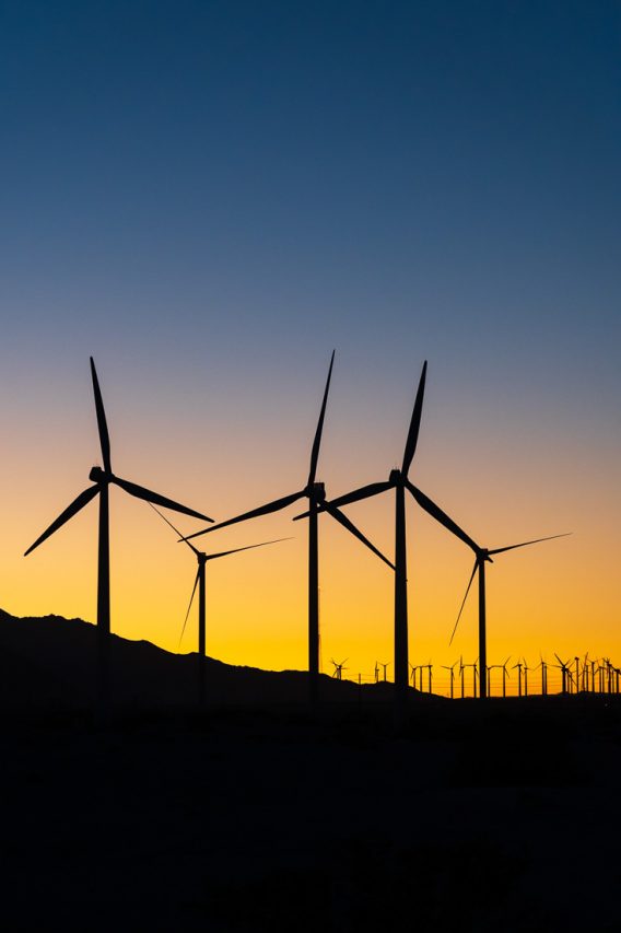 Wind farm silhouette against twilight sky