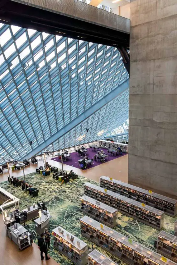 Inside Seattle Central Library with blue diamond steel and glass exterior wall