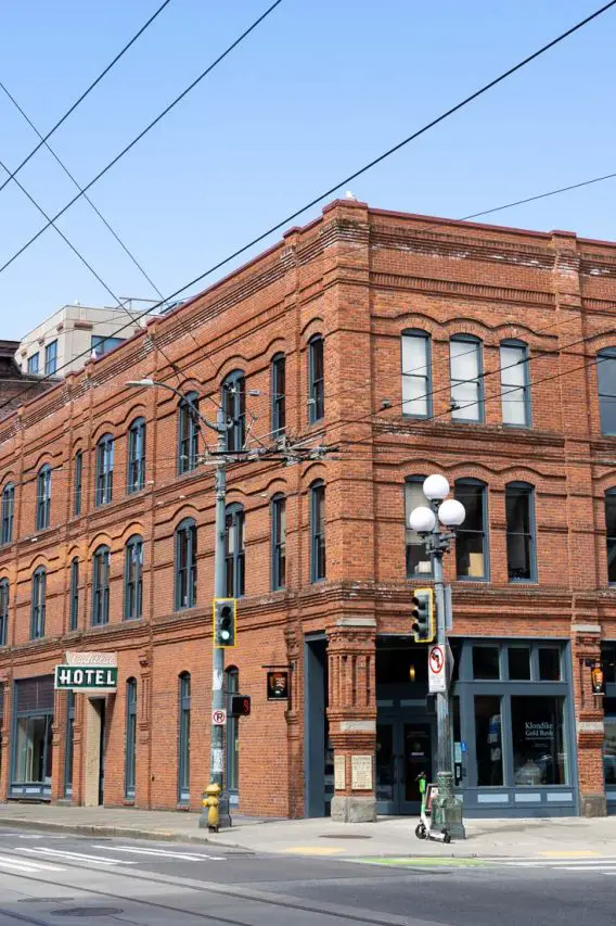 Red brick, historic building with Cadillac Hotel sign