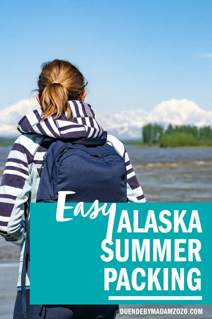 Woman wearing backpack looking out a mountains with title "Easy Alaska Summer Packing"