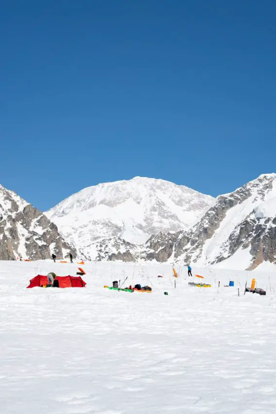 Base camp tents with Denali's peak in the background