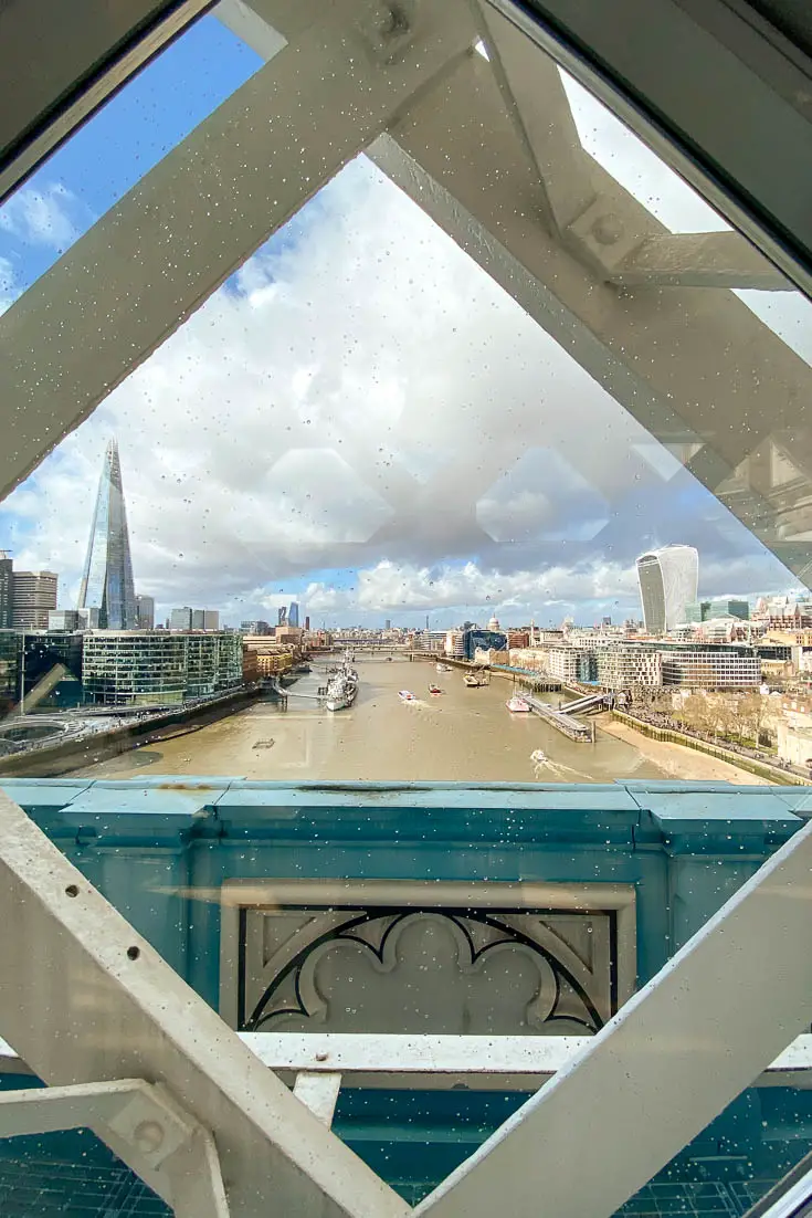 View of the Thames and London skyline from inside trellises of bridge